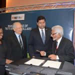 Derryck Murray signs the MOU